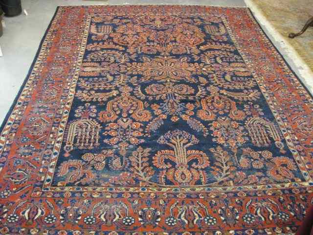 Appraisal: Lillihan Persian Handmade Room Size Rug semi-antique florals on deep