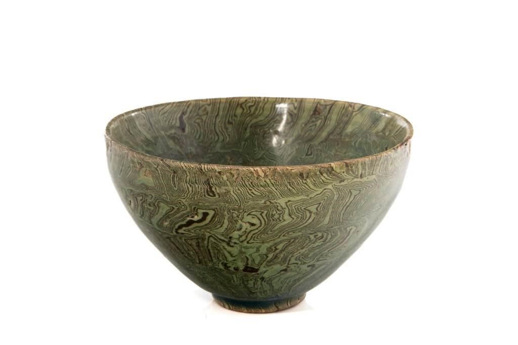 Appraisal: Chinese a marble glazed bowl in green tone with irregular