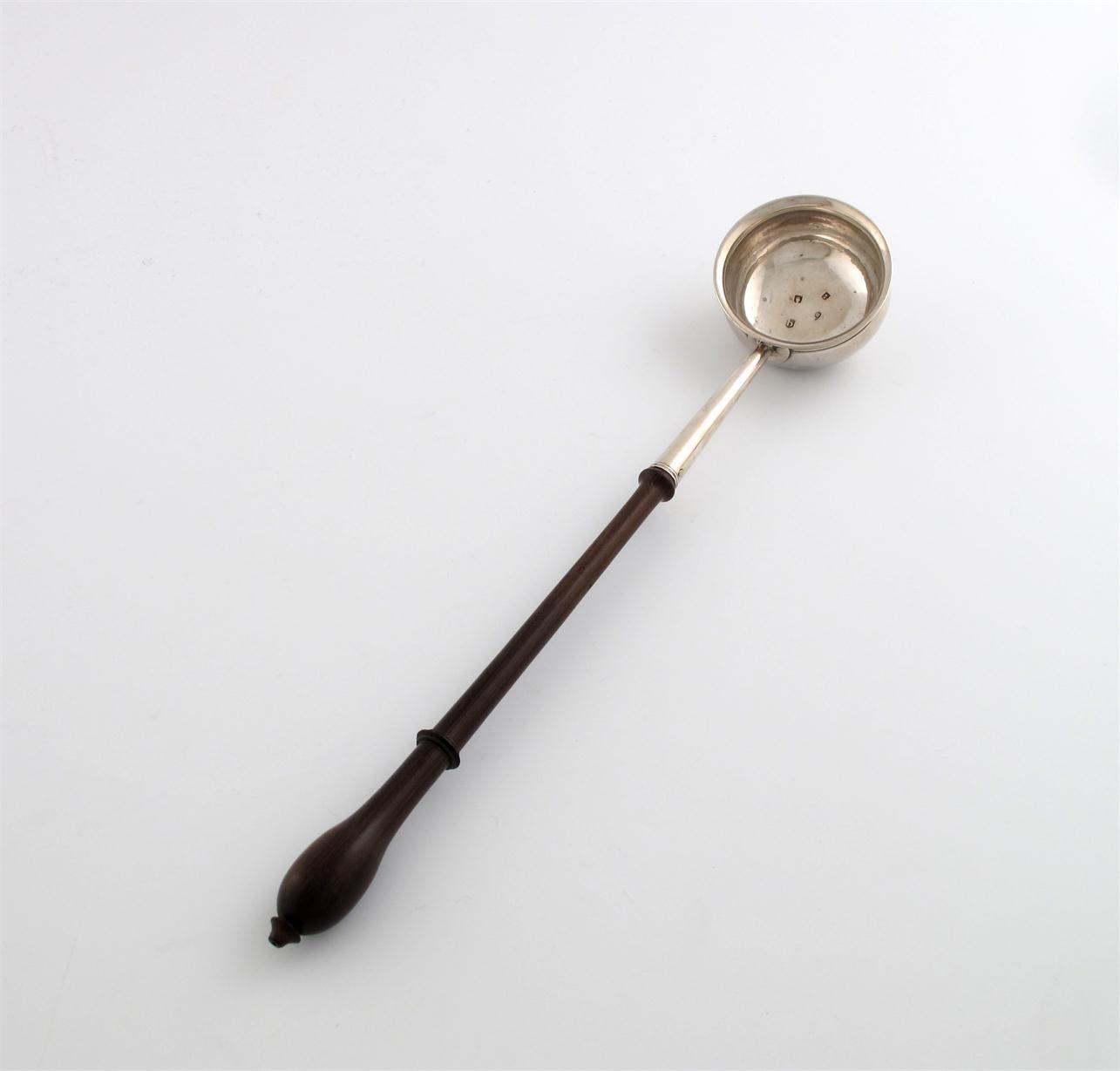 Appraisal: A George II silver toddy ladle