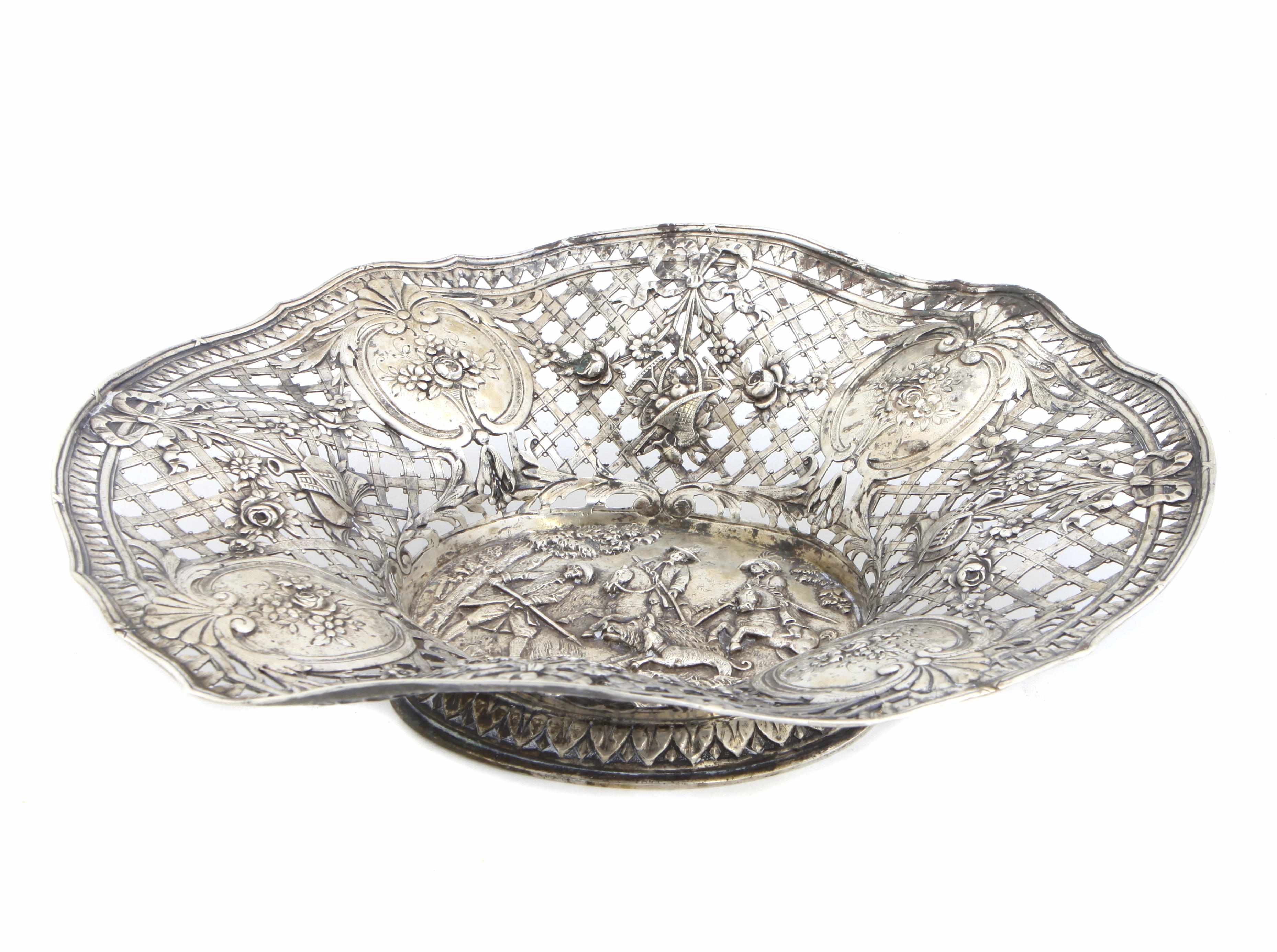 Appraisal: A German standard silver oval pierced figural Historismus footed bowl