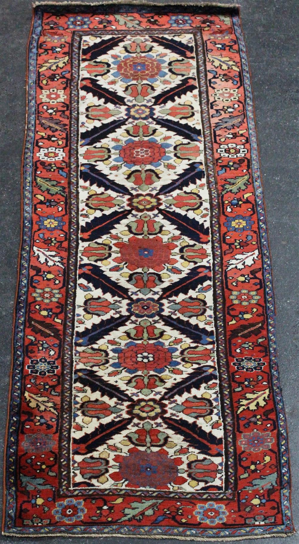 Appraisal: KAZAK WOOL RUNNER colors include blue green mustard ivory red