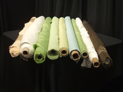 Appraisal: NINE ROLLS OF DESIGNER FABRIC In coordinating tones of cream