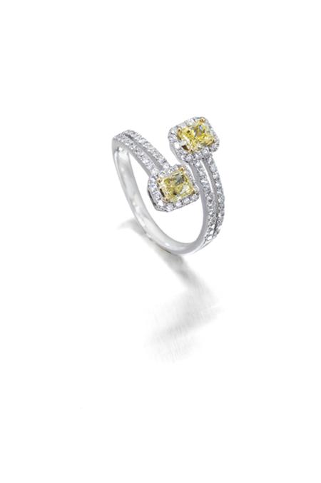 Appraisal: A contemporary fancy yellow and colourless diamond set ring of