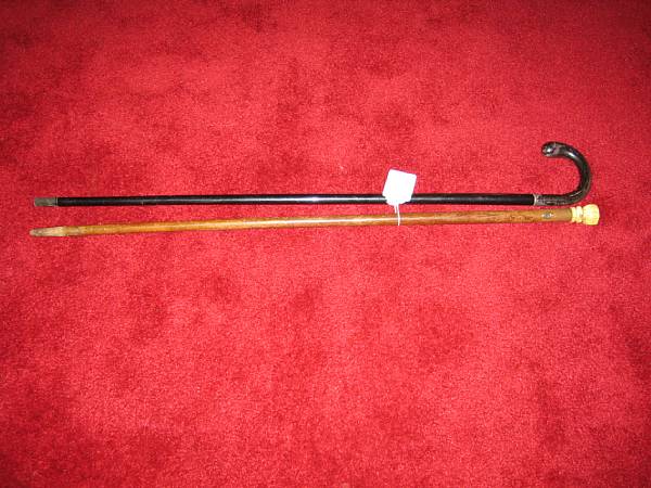 Appraisal: A set of a walking stick and a cane