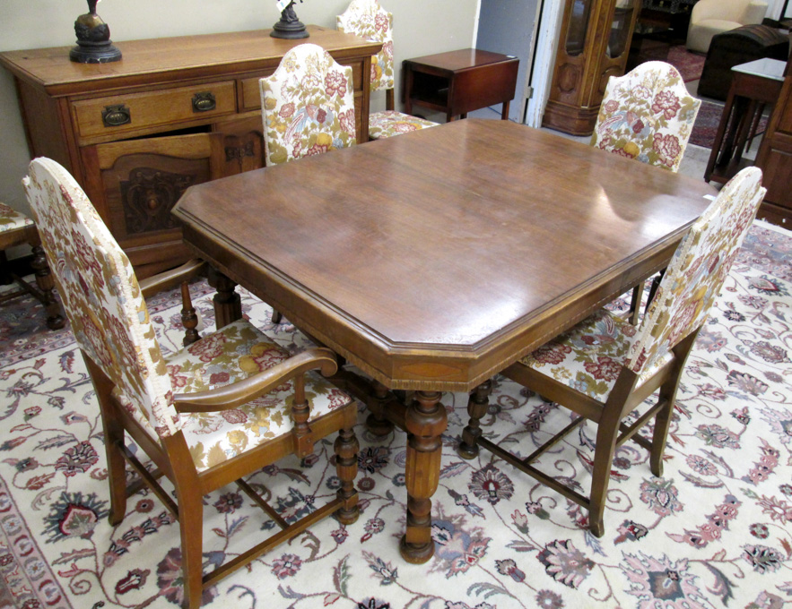 Appraisal: WALNUT DINING TABLE AND CHAIR SET WITH LEAVES Gregory Furniture