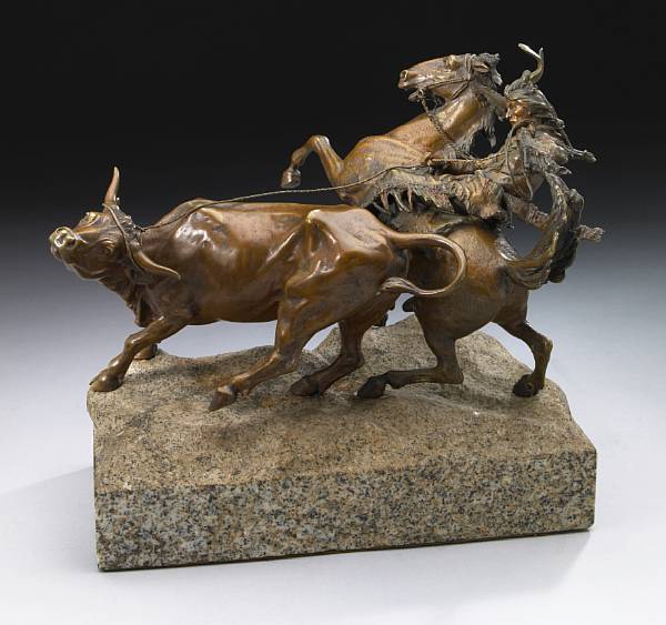 Appraisal: An Austrian patinated bronze figural group Indian Cowboy cast after