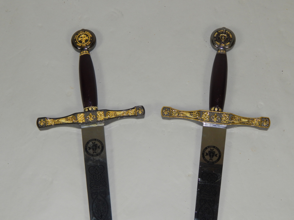 Appraisal: A pair of replica The King Reigns and his son