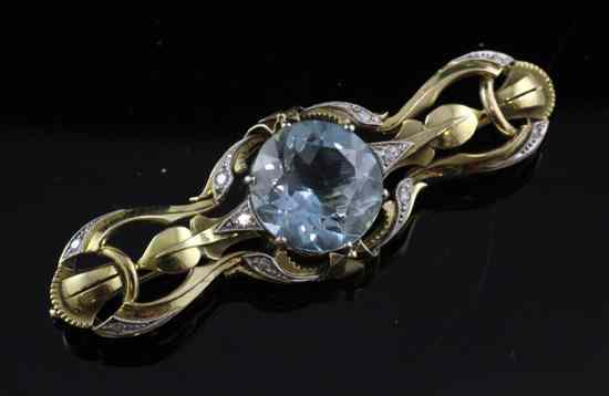 Appraisal: A continental gold aquamarine and diamond brooch in gross g