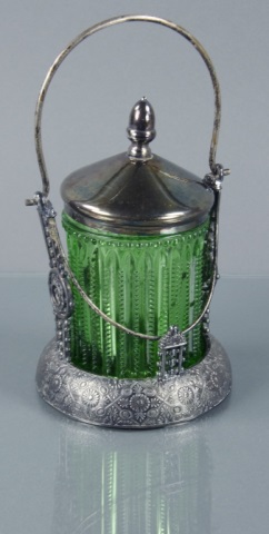 Appraisal: Victorian Green Zipper Paneled Pickle CasterGlass insert decorated with cut