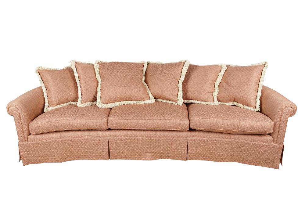 Appraisal: RUST UPHOLSTERED SOFAunsigned with curved seat and six throw pillows