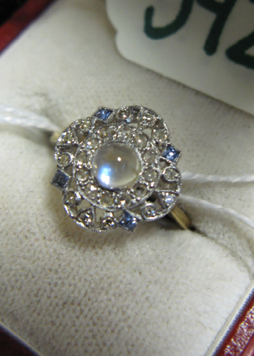 Appraisal: MOONSTONE SAPPHIRE DIAMOND AND EIGHTEEN KARAT WHITE GOLD RING centering