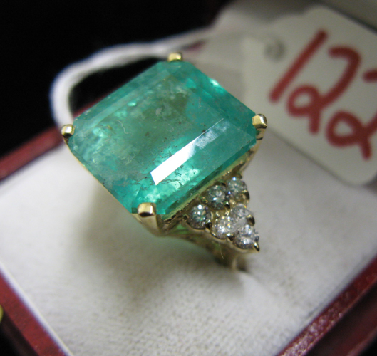 Appraisal: EMERALD DIAMOND AND FOURTEEN KARAT GOLD RING centered and prong