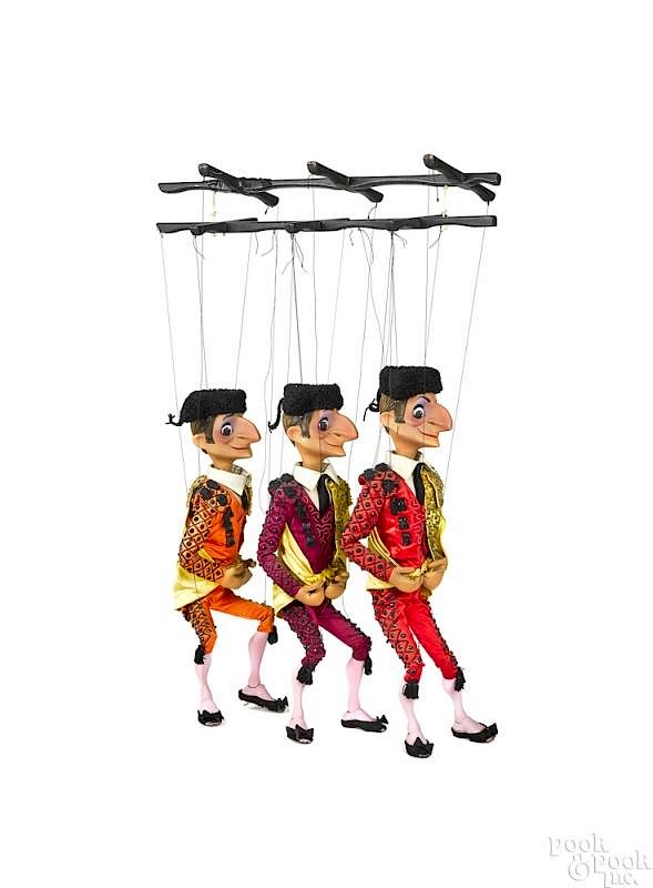 Appraisal: Three Matadors marionette Three Matadors marionette with three figures wearing