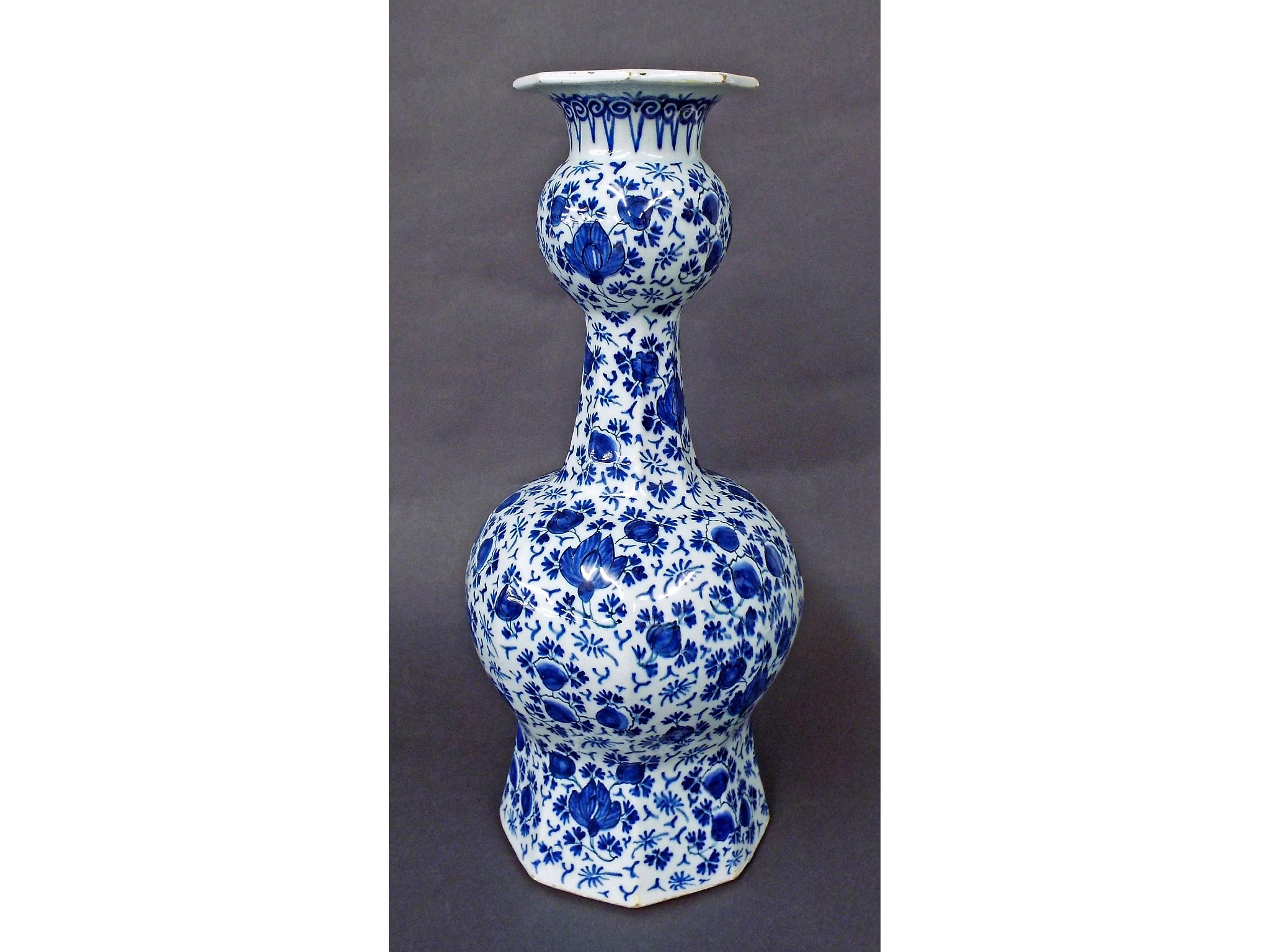 Appraisal: Antique Delft faceted bottle neck baluster vase with geometric floral