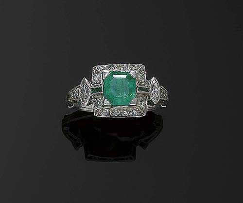 Appraisal: EMERALD AND DIAMOND RING ca Platinum Decorative ring the top