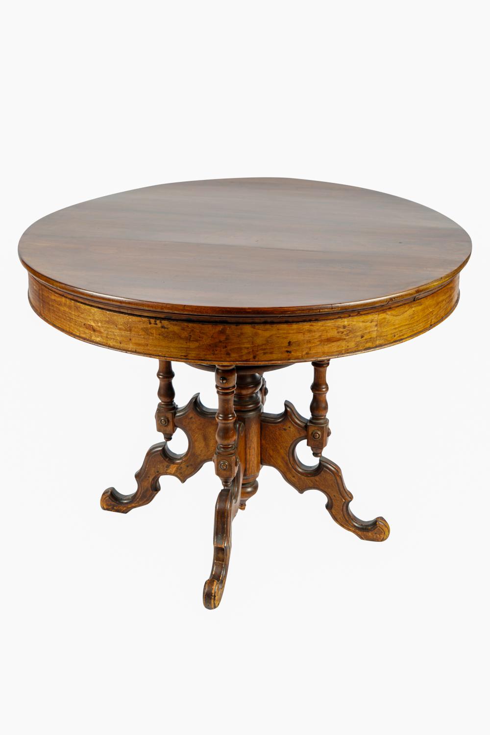 Appraisal: VICTORIAN PARLOR TABLEthe round top on a carved and turned