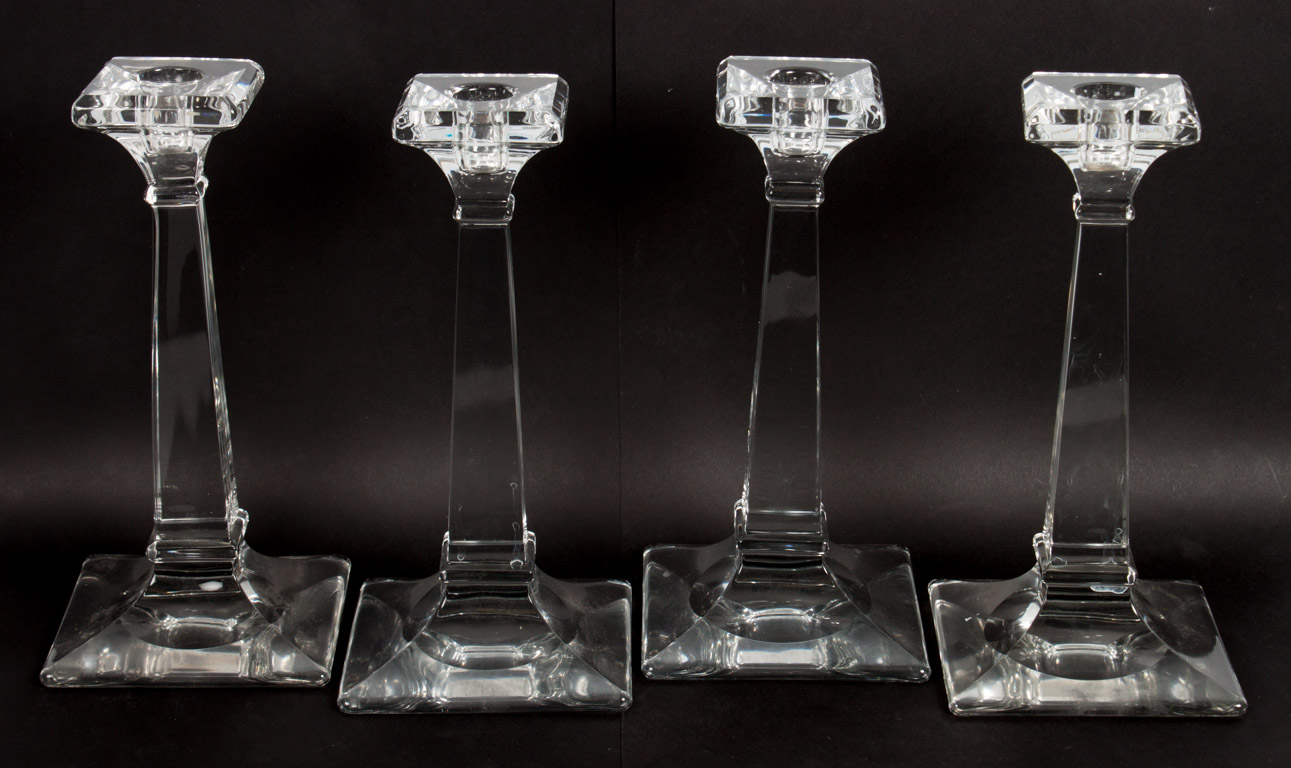 Appraisal: Four colorless glass candlesticks second quarter- th century square form