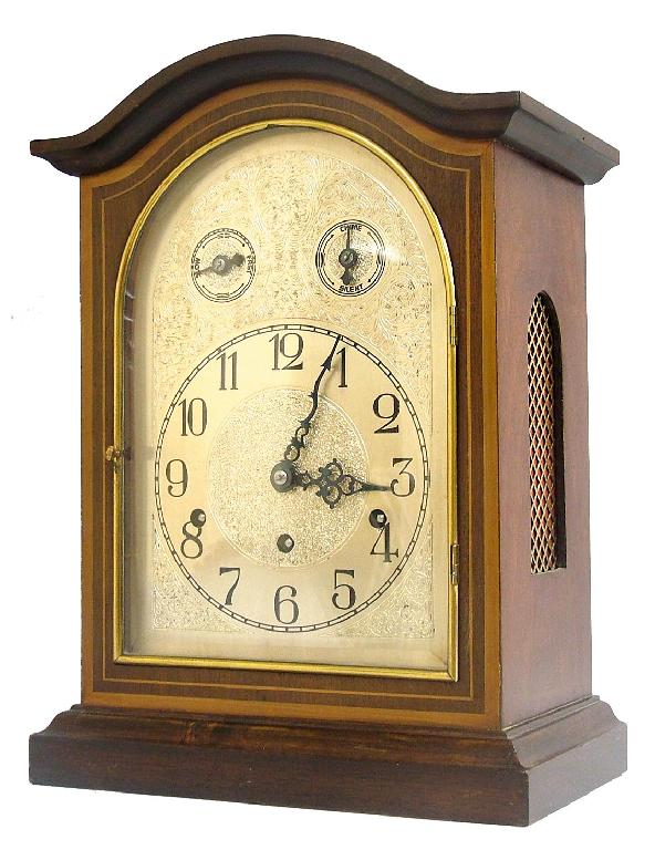 Appraisal: German mahogany three train bracket clock the movement striking on