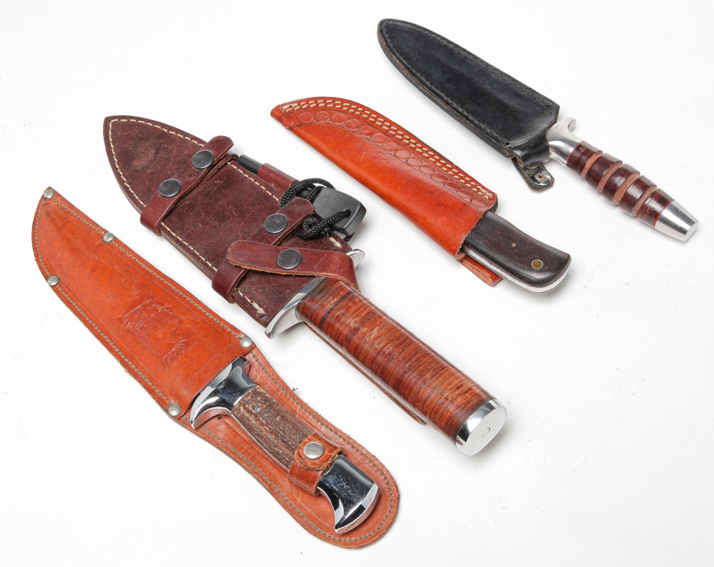 Appraisal: FOUR FIXED-BLADE HUNTING KNIVES Twentieth century A Muela with antler