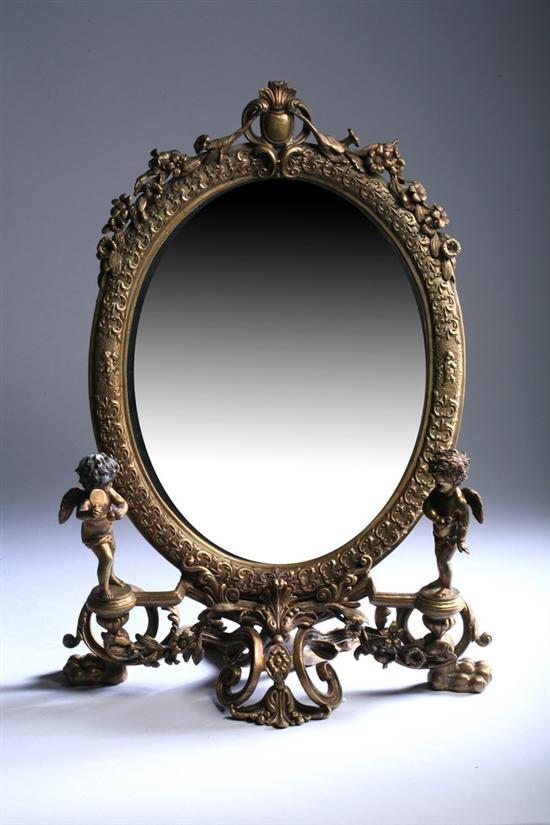 Appraisal: LOUIS XV-STYLE BRONZE-DOR VANITY MIRROR early th century Scrolling base