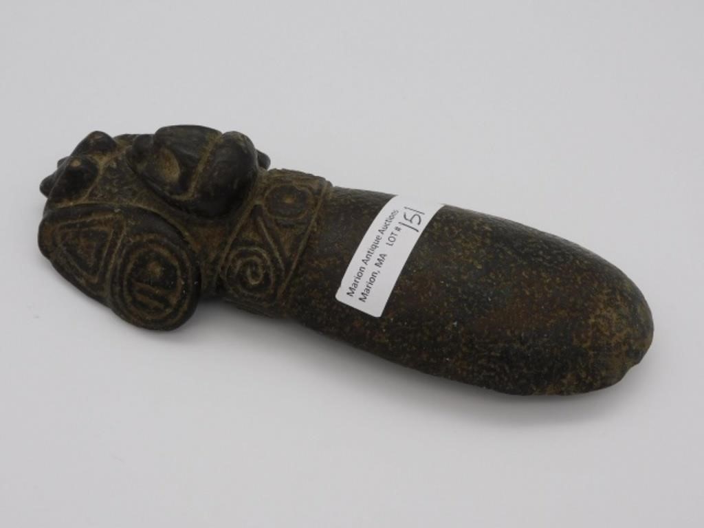 Appraisal: of interlocking bird head symbols circle axe Made of magnetite