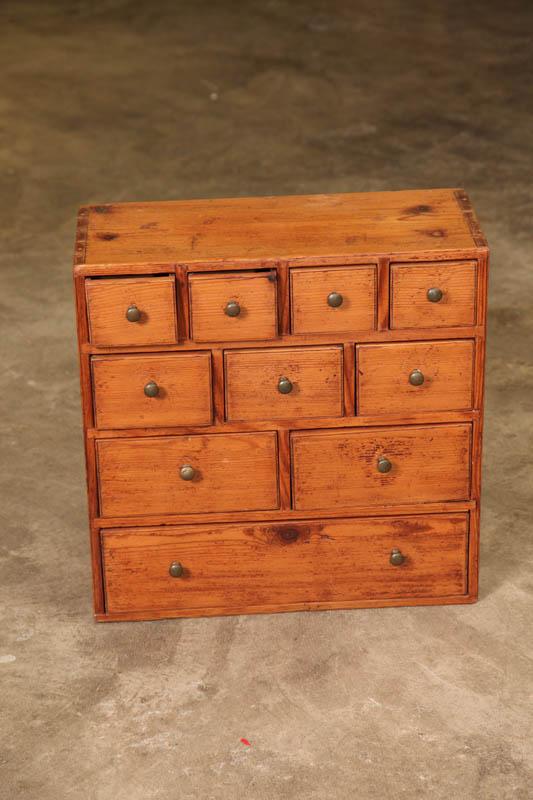 Appraisal: APOTHECARY CHEST Pine ten drawer chest with brass pulls and