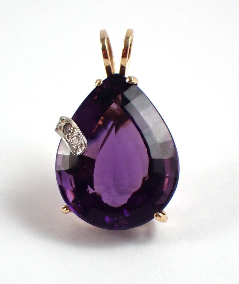 Appraisal: AMETHYST DIAMOND AND FOURTEEN KARAT GOLD PENDANT The k yellow