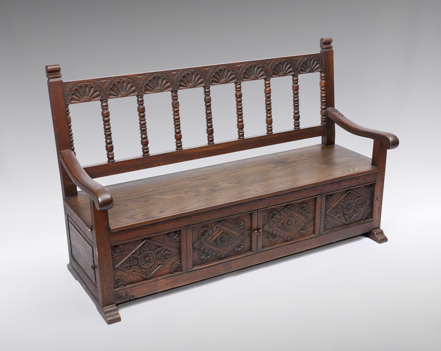 Appraisal: CARVED OAK HALL BENCH Carved Oak hall bench having a