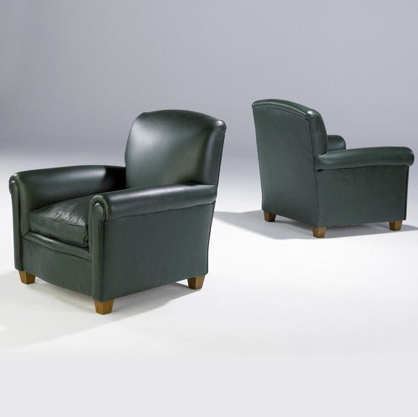 Appraisal: ART DECO Pair of club chairs upholstered in forest green