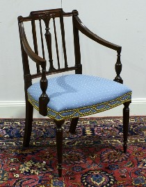 Appraisal: A George III style mahogany and upholstered open armchair