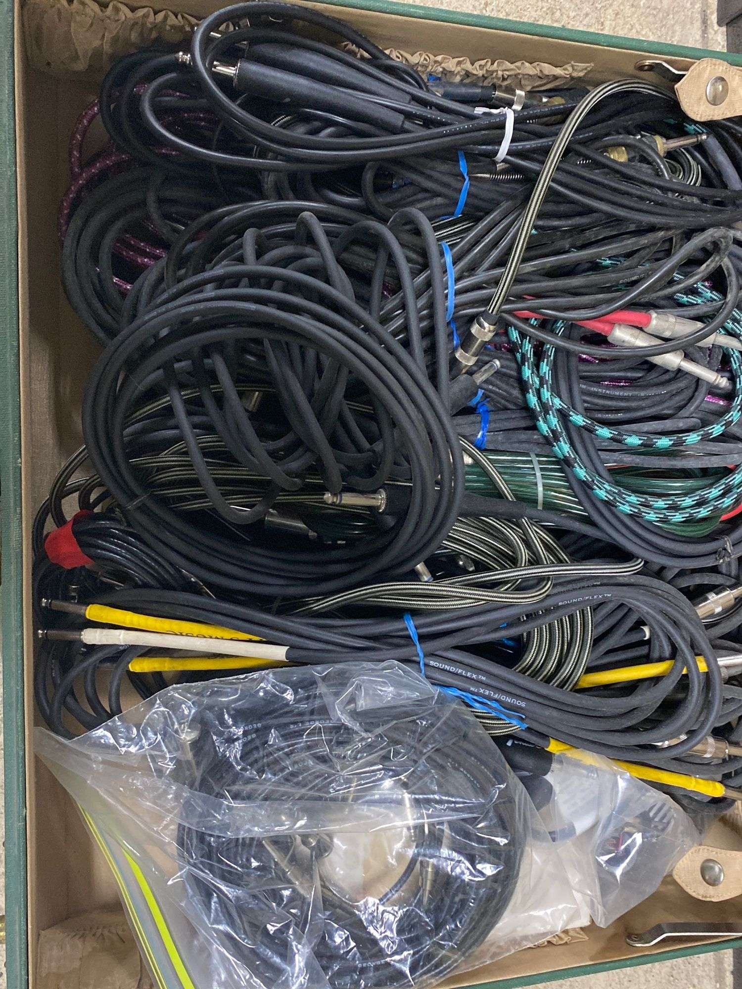 Appraisal: Suitcase full of cords and cablesSuitcase full of cords and