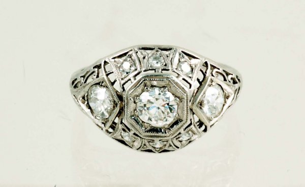 Appraisal: Diamond filigree ring in marked platinum setting Center approximately carat