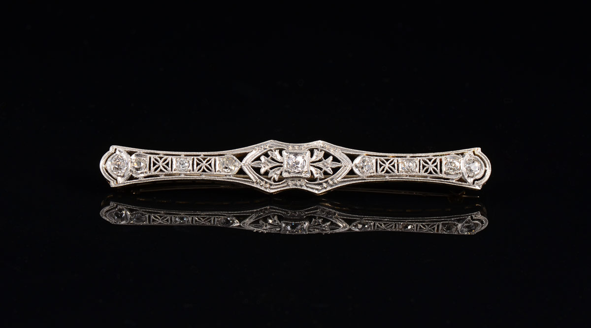 Appraisal: EDWARDIAN PLATINUM DIAMOND FILIGREE PIN '' long platinum brooch contains