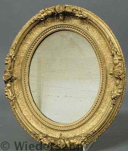 Appraisal: Oval mirror with gilt decorated frame c x