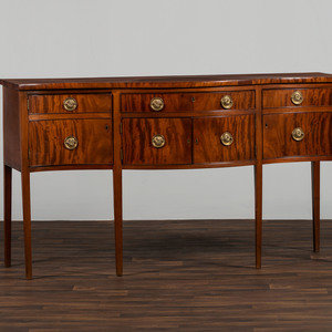 Appraisal: A Federal Figured Mahogany Serpentine Sideboard Early th Century brasses