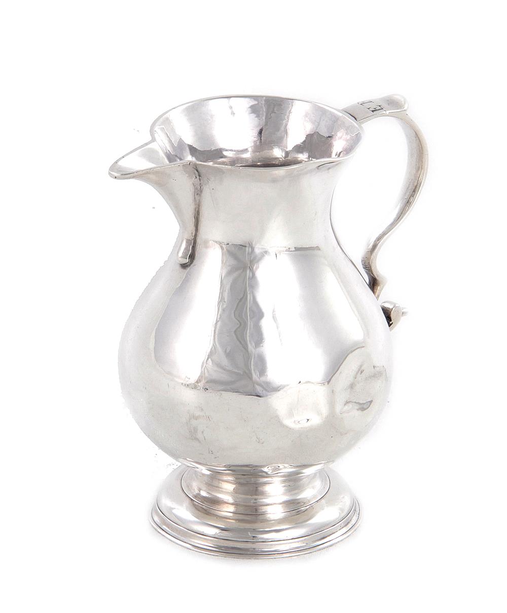 Appraisal: George II sterling creamer London dated baluster form sparrow's-beak spout