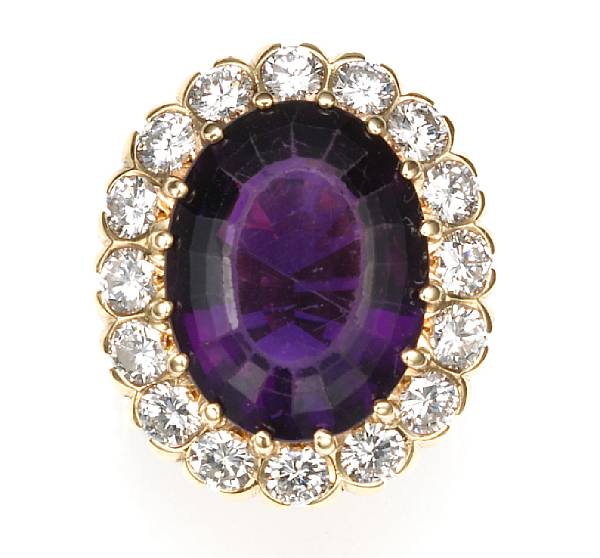 Appraisal: A diamond and amethyst ring oval-shaped amethyst weighing approximately carats