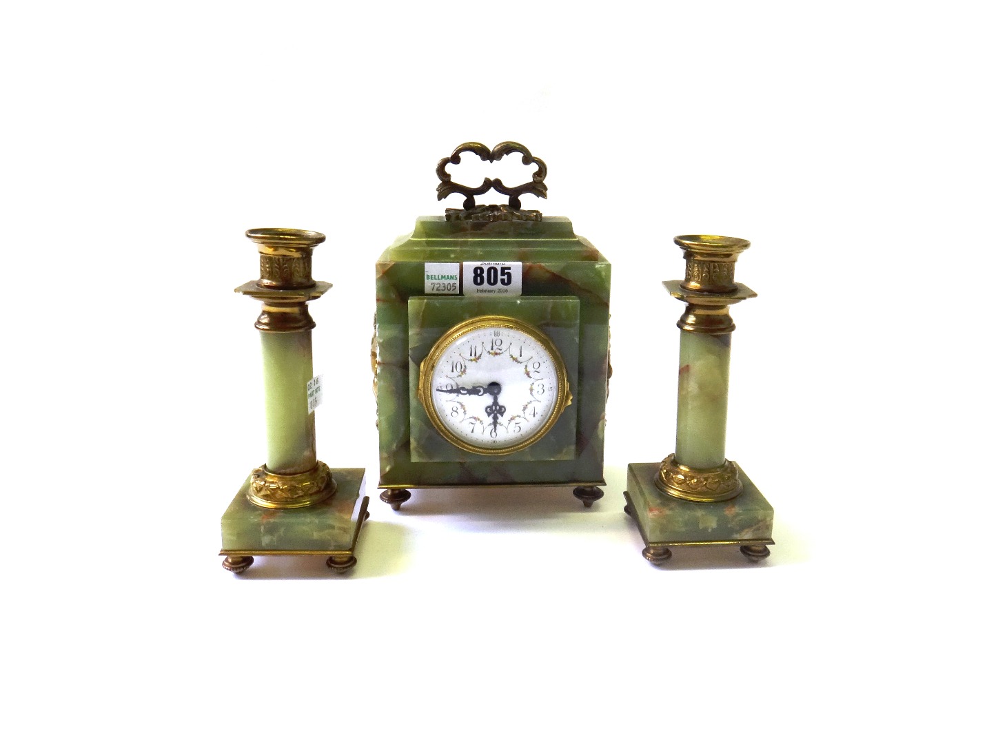 Appraisal: An onyx and ormolu mounted clock garniture early th century