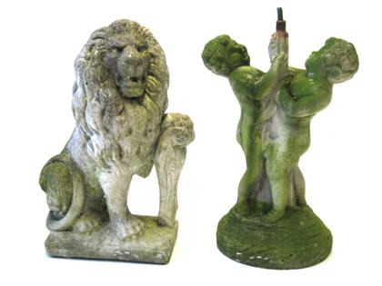 Appraisal: Two poured concrete garden elements The first a lion resting