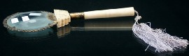 Appraisal: A Chinese ivory and silver gilt mounted magnifying glass th