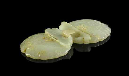 Appraisal: A Chinese Jade Two-Part Buckle of pale celadon color with