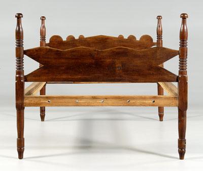 Appraisal: Georgia walnut bedstead scalloped headboard and geometrically carved footboard turned