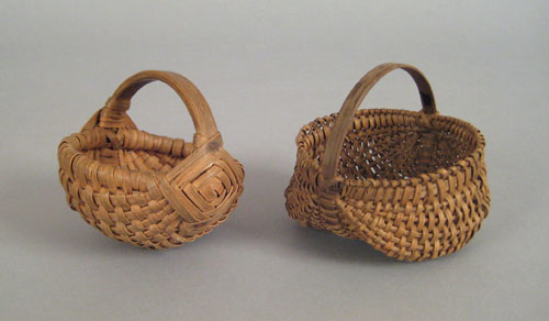 Appraisal: Two miniature splint baskets th c to include a buttocks