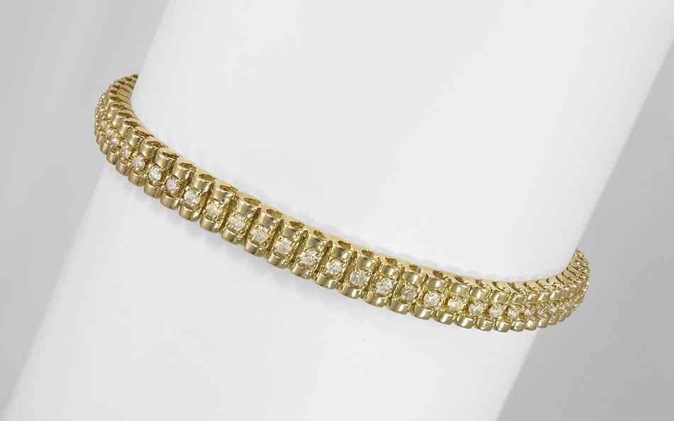 Appraisal: K CTW DIAMOND BRACELET K yellow gold bracelet contains round