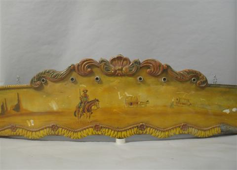 Appraisal: CAROUSEL SIGN The shaped section painted with a frontiersman with