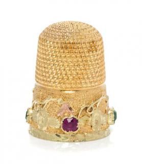 Appraisal: An American Gold and Gemstone Thimble the knurled top and