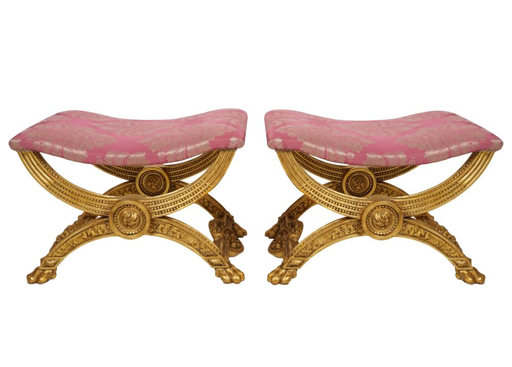 Appraisal: PAIR OF GILTWOOD CURULE STOOLScontemporary with red damask fabric inches