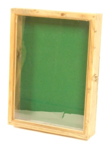 Appraisal: A pine table top display cabinet with a green lined