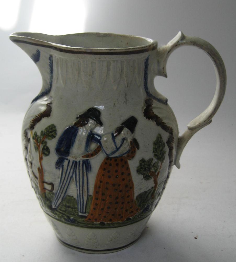 Appraisal: A PRATTWARE JUG early th century of baluster form moulded