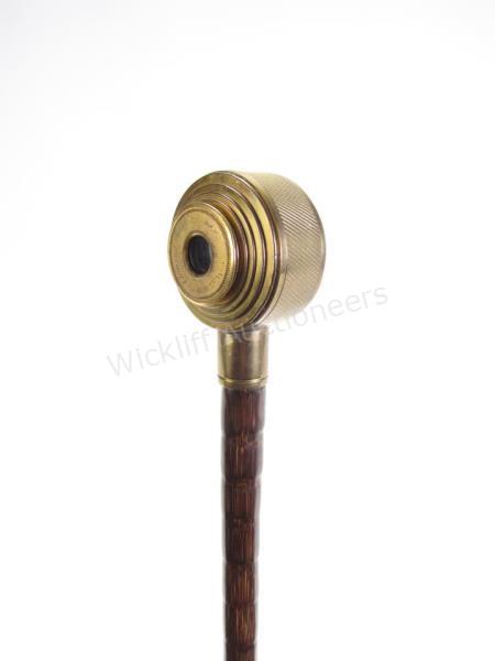 Appraisal: Voyeur's Spyglass Cane partridge wood shaft six pull brass spyglass